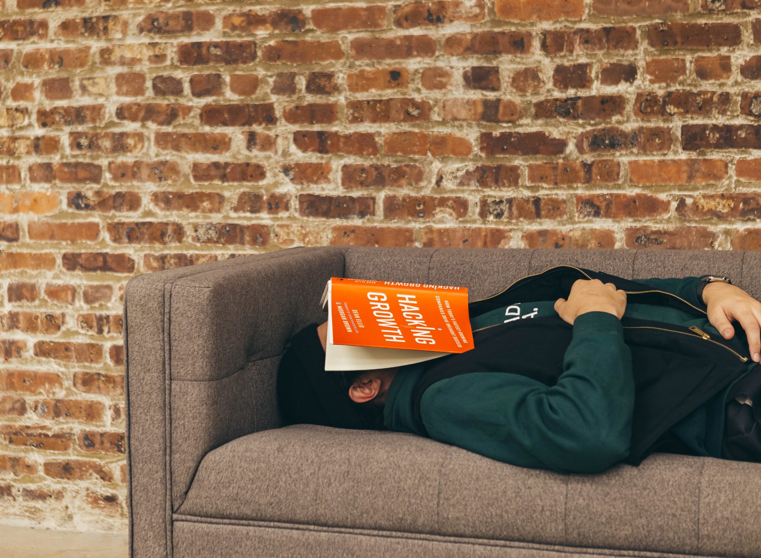 Deadbeat on couch asleep instead of growing